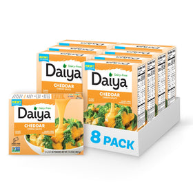 Daiya dairy-free cheddar sauce pack showing convenient squeeze packaging.