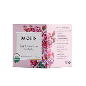 DAKSHIN Organic Rose Cardamom Tea Bags in packaging, inviting a fragrant ritual.