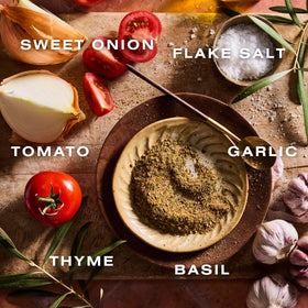 Pouring Dalkin & Co Tuscan blend for quick, bold tomato dishes.