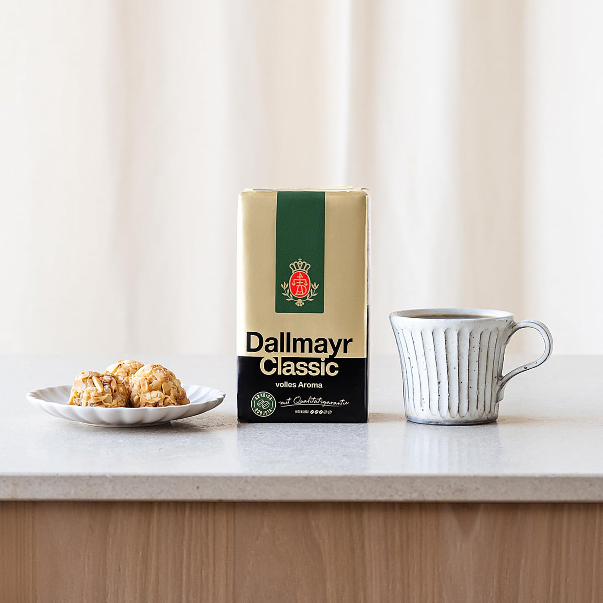 Dallmayr Classic Ground Coffee being brewed in a filter setup for a rich morning cup