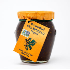 Dalmatia Fig Spread jar open, rich texture ready for cheese boards and toast.