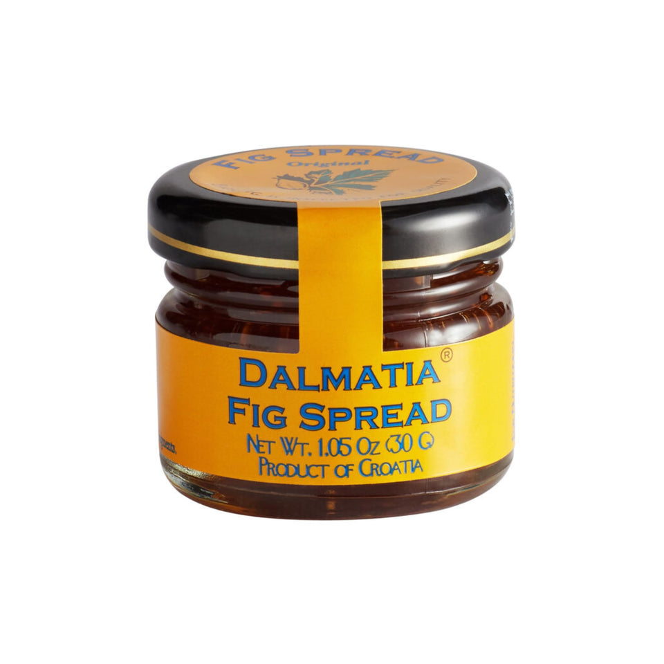 Dalmatia mini fig spread packaging on a cheese board for premium entertaining.