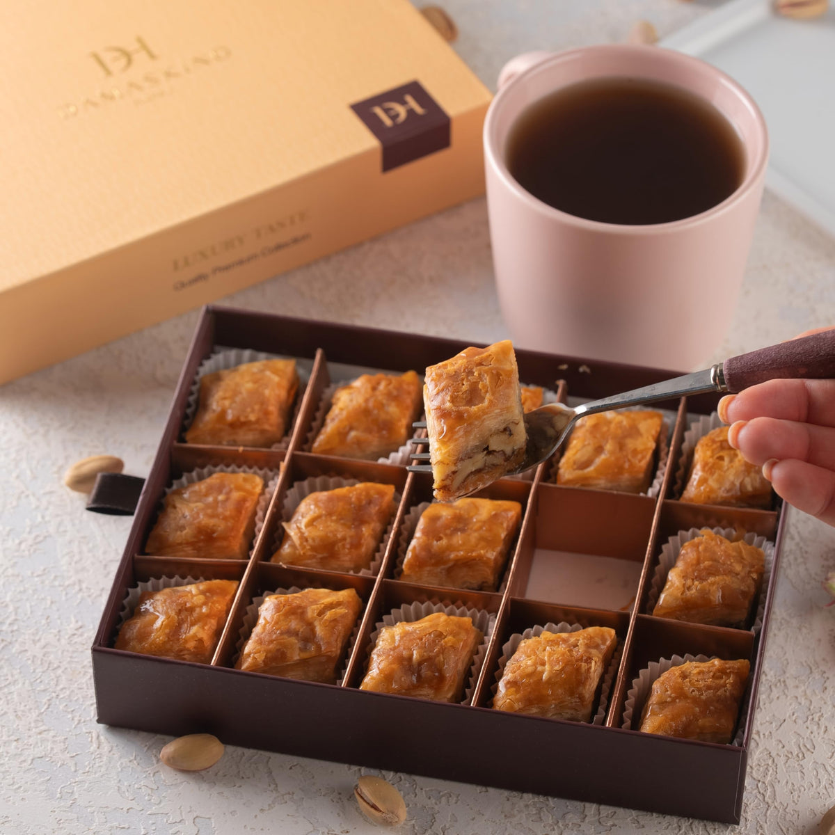 Damaskino Home walnut baklava pastries collection highlighting buttery phyllo and walnut filling.
