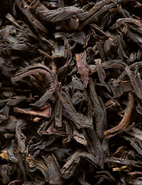 Dammann Frères black tea blend ingredients showcased for rich caramel-infused cups
