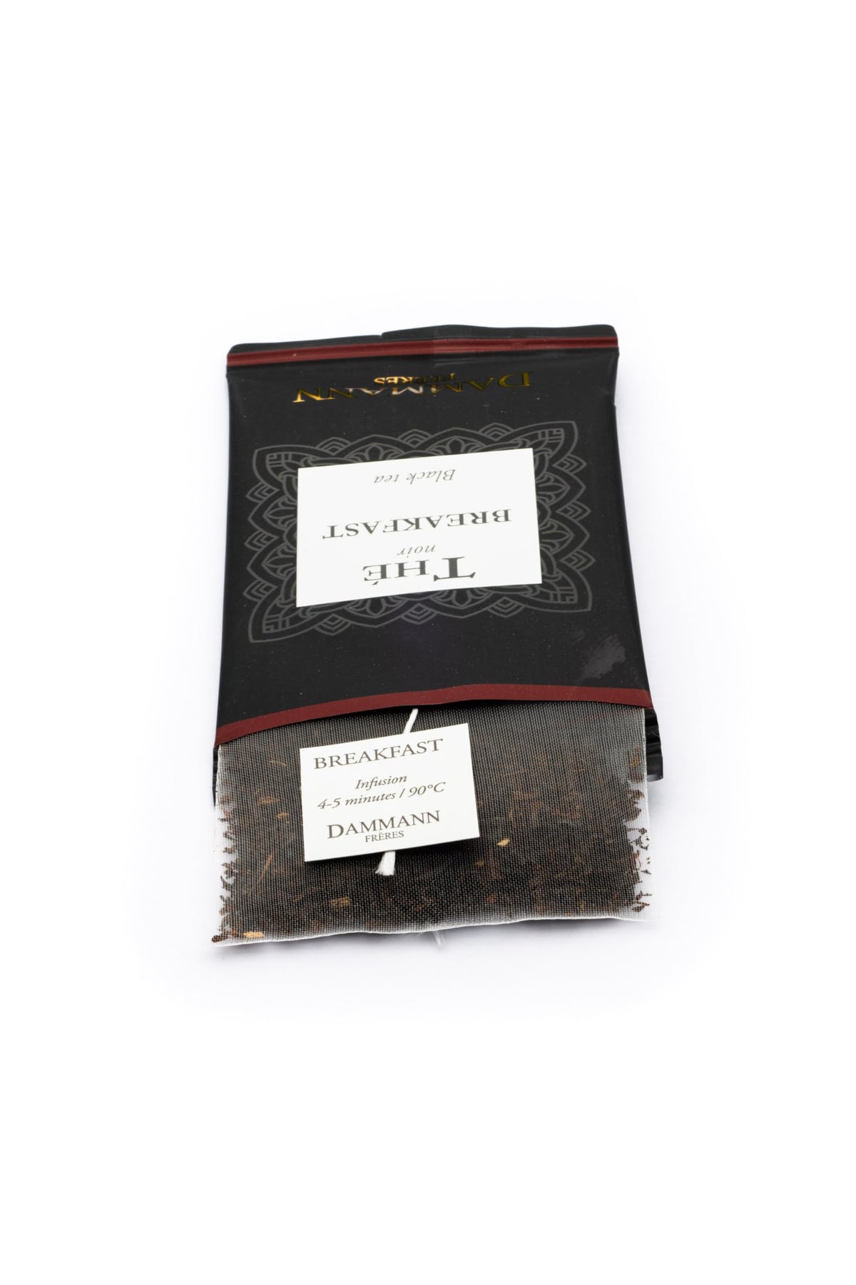 Dammann Freres Breakfast Blend brewing loose-leaf for a robust, full-bodied cup.