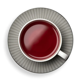 Close-up of Nuit d'été ingredients with hibiscus, apple, and rosehip blend.