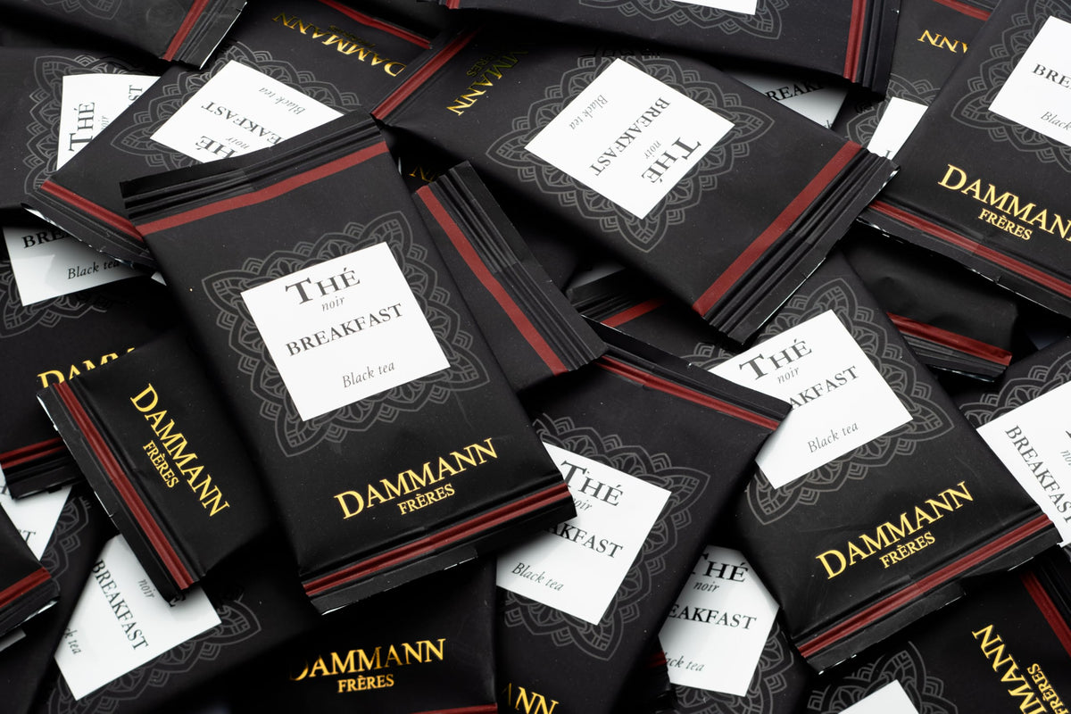 Dammann Freres Paris packaging display signals luxury tea craftsmanship.