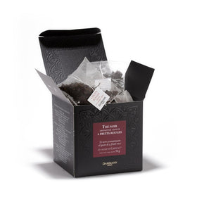 Dammann Freres red-fruits tea bags steeping hot for a fruity aroma.