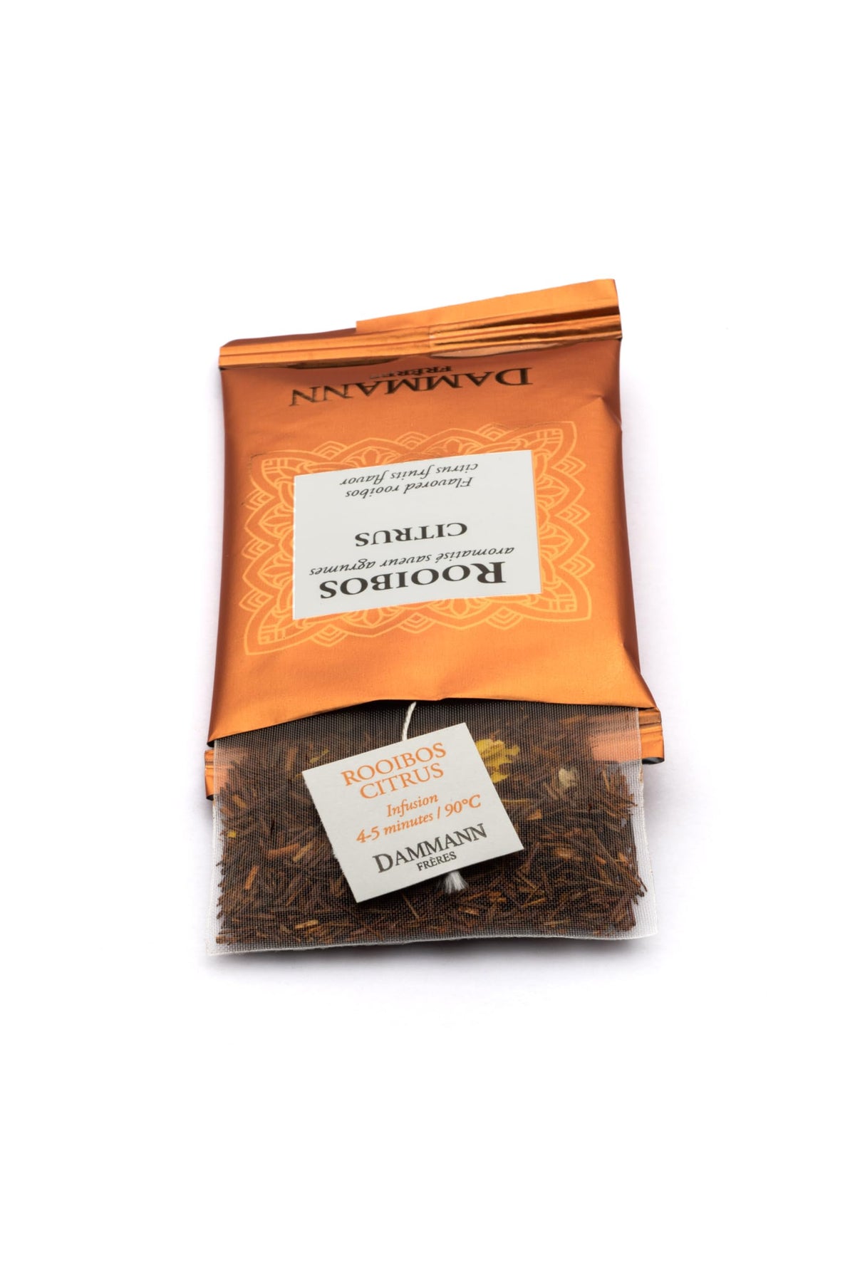 Dammann Freres rooibos citrus tea steeping in cup highlights bright citrus aroma and smooth finish