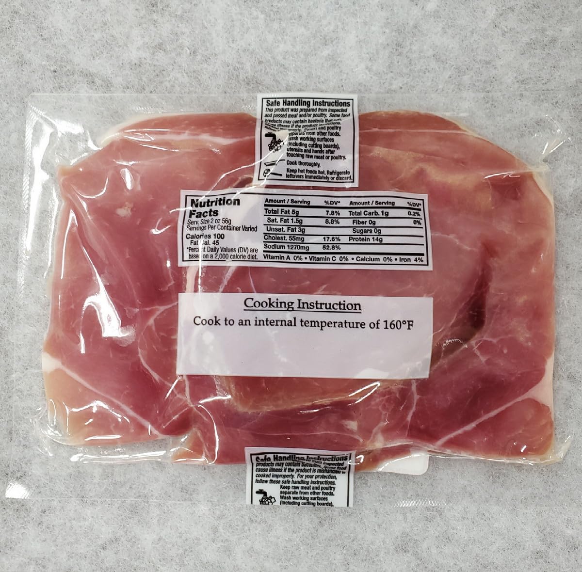 Dan'l Boone Inn Brand country ham biscuit slices ready to stack on a plate