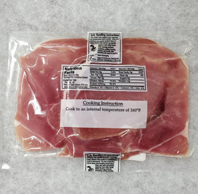Dan'l Boone Inn Brand country ham biscuit slices ready to stack on a plate