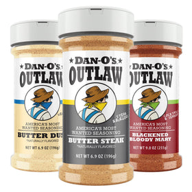 Dan-O's Outlaw Butter Dust bottle pour delivers buttery flavor for popcorn and veggies.