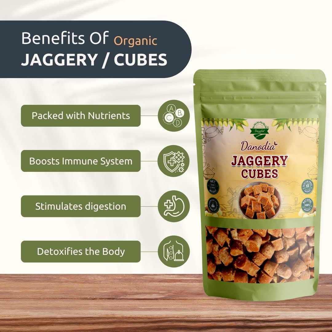 Danodia Foods jaggery cubes dissolving in hot water to sweeten tea smoothly.