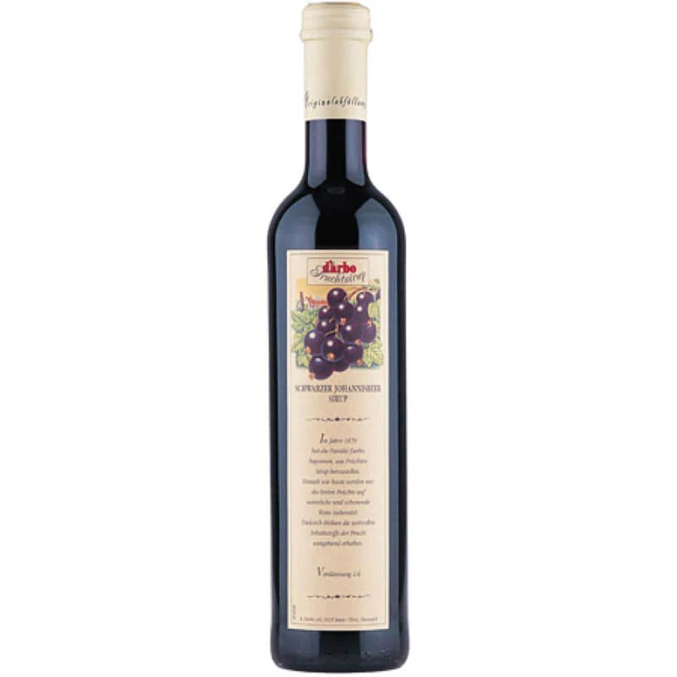 Darbo black currant syrup bottle for enhancing desserts and cocktails with natural fruit flavor.