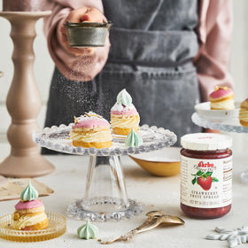 Darbo strawberry spread on bagels for a quick snack.
