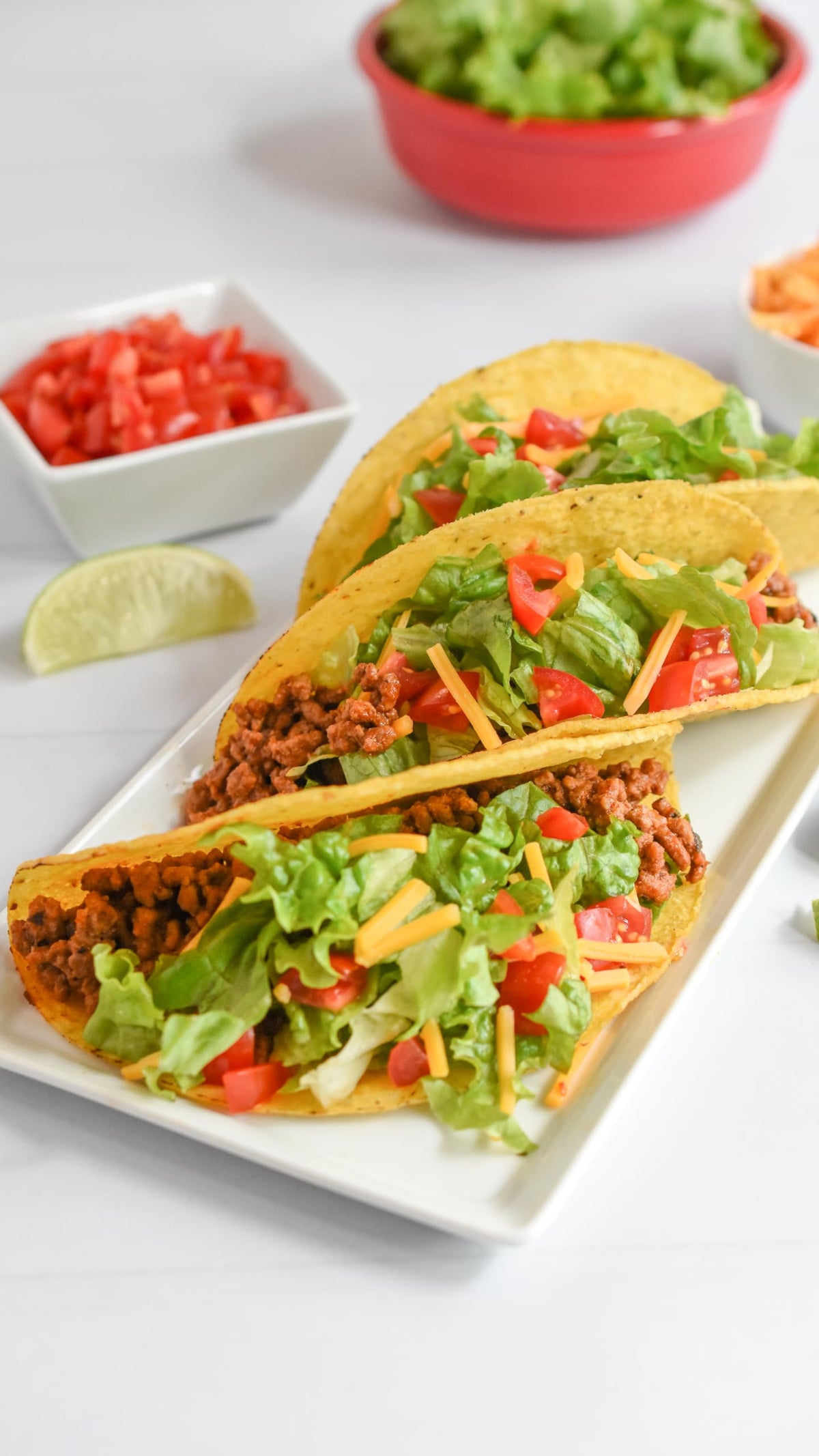 Finished tacos featuring Dash seasoning and vibrant toppings.