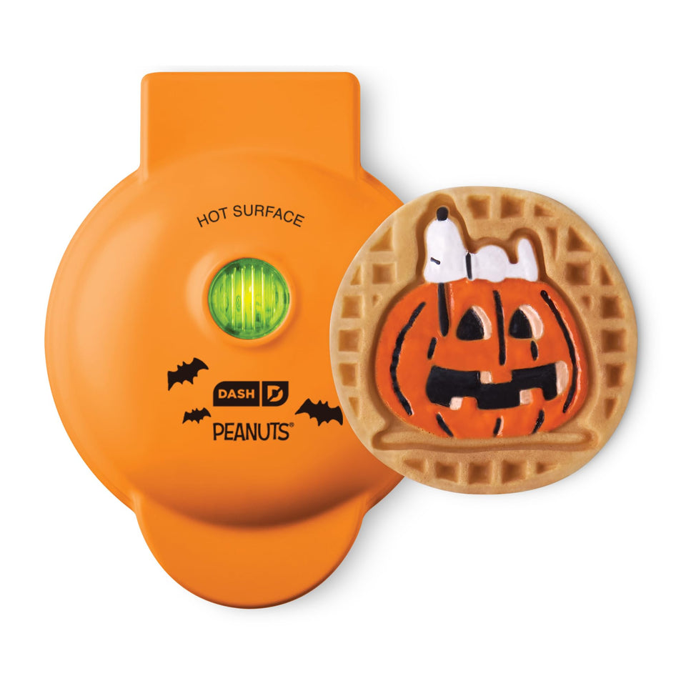 DASH Snoopy Jack-o-Lantern mini waffle maker front view, ideal for Halloween party breakfasts.