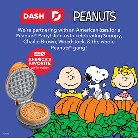 DASH Snoopy waffle maker cooking surface showing even heat for quick, uniform waffles.