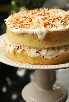 Dasher's Spice & Beans coconut flakes sprinkled on cupcakes for a festive garnish.