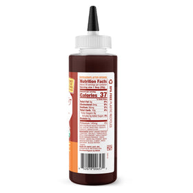 Date Lady BBQ Sauce bottle pouring glaze for rich, smoky finish.