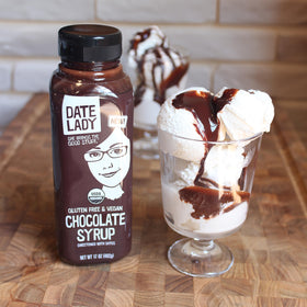 Squeeze bottle of Date Lady Chocolate Syrup for mess-free storage