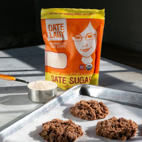 Date Lady Organic Date Sugar in a coffee cup showing slow dissolution.