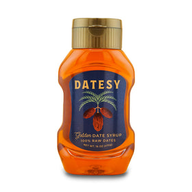 Datesy Golden Date Syrup bottle pouring, smooth instant-dissolve sweetness for drinks