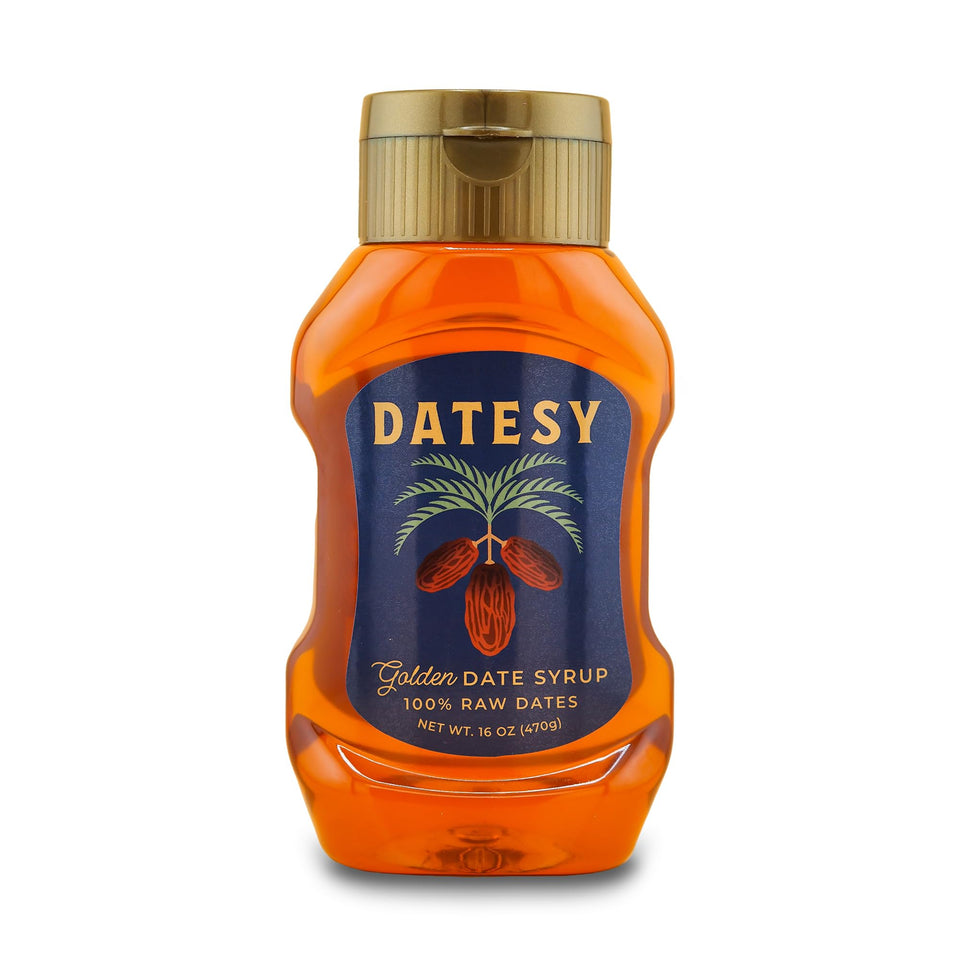 Datesy Golden Date Syrup bottle pouring, smooth instant-dissolve sweetness for drinks