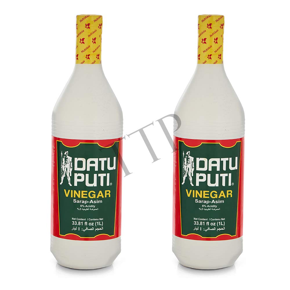 Datu Puti Cane Vinegar bottle close-up highlighting rich, slightly sweet profile for dressings.