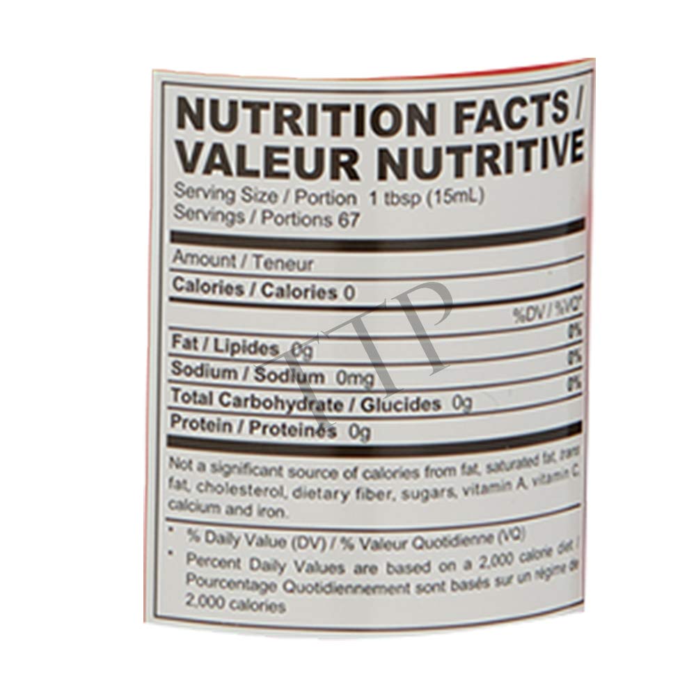 Datu Puti Cane Vinegar label on glass bottle, enhances flavor in Filipino dishes.