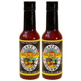 Dave's Gourmet Carolina Reaper hot sauce pack of 2 bottles on display for bold flavor exploration.