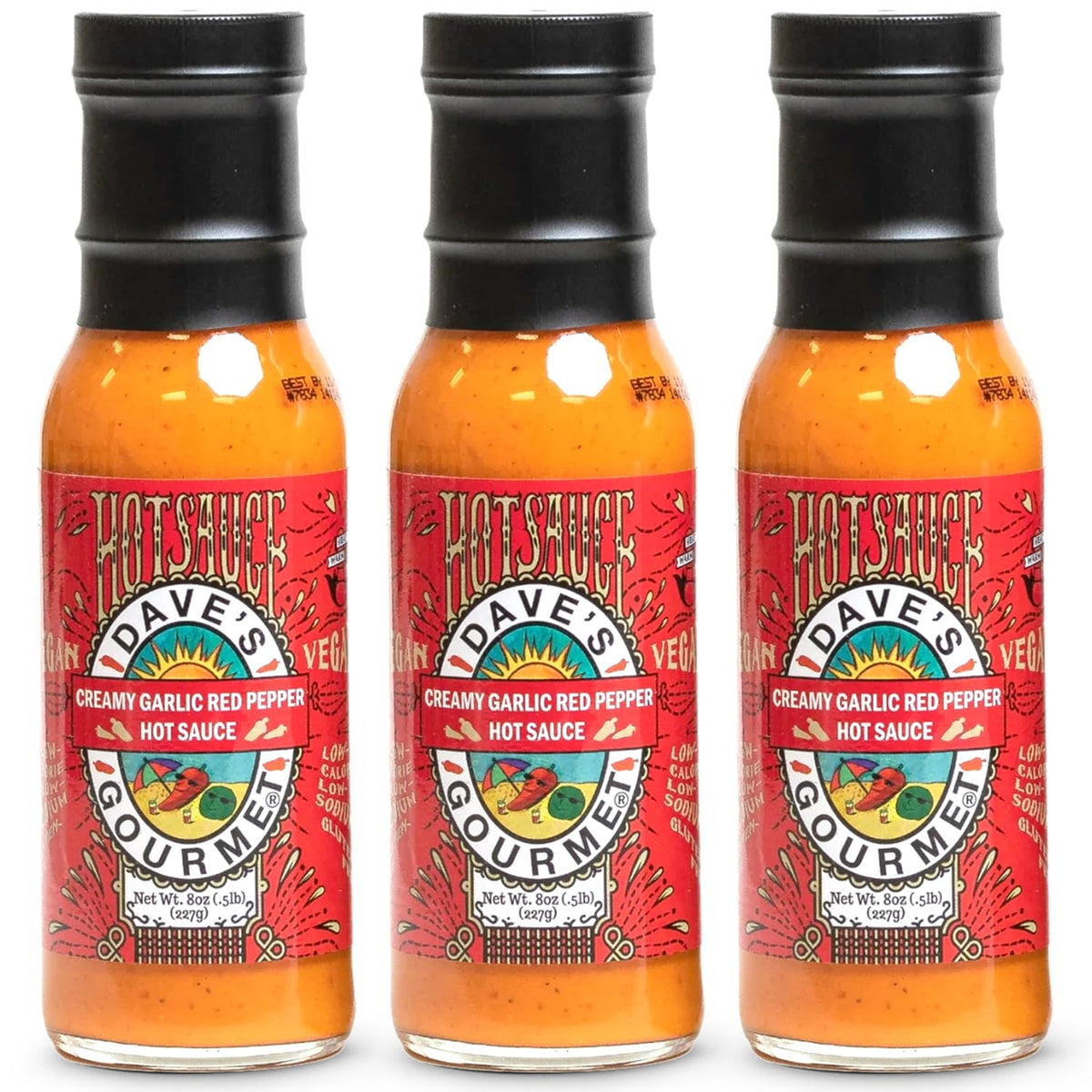 Dave's Gourmet creamy garlic red pepper sauce bottle showing rich color and creamy texture for versatile meals
