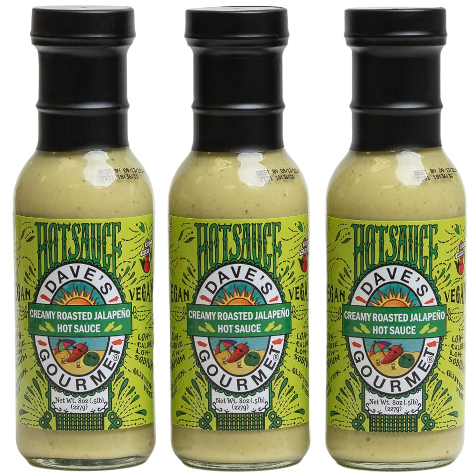 Dave's Gourmet Creamy Roasted Jalapeño Hot Sauce bottle closeup, showcasing bold creamy heat.