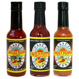 Dave's Gourmet 3-pack front view with bold heat from three 5oz bottles