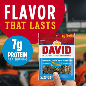 Close-up of DAVID Seeds Jumbo Sunflower Seeds with spicy queso coating for added flavor.
