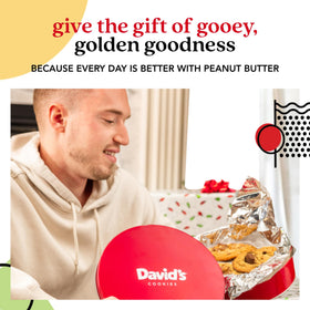 David's Cookies elegant tin on a desk, ideal corporate gift or well-wish.