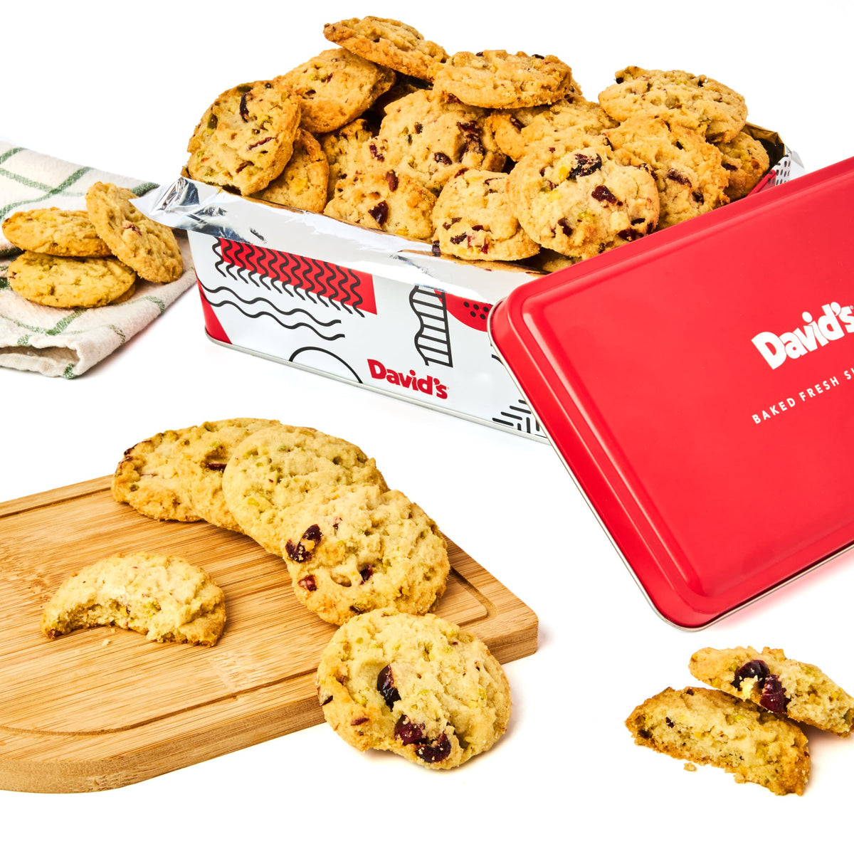 David's Cookies cranberry pistachio biscuits tin front view, ideal for gifting occasions.