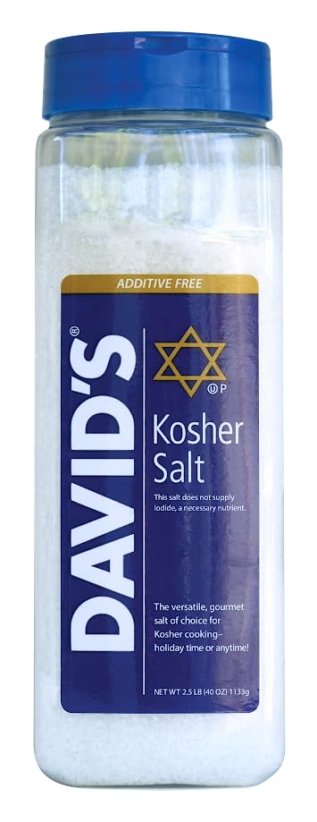 David's Kosher Salt pours from a measuring spoon for controlled sprinkling.