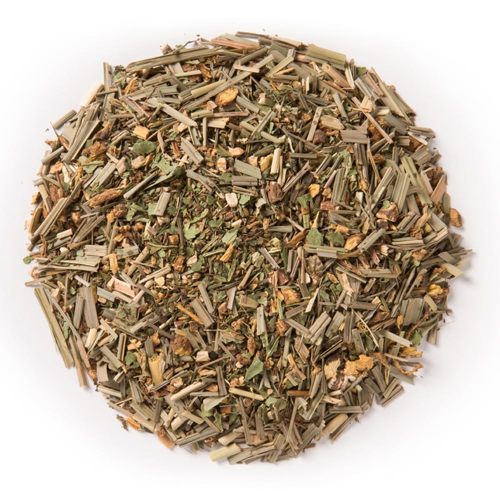 Davidson's Organics Detox tea cup pour, showcasing vibrant leaves and an inviting aroma for calm focus.