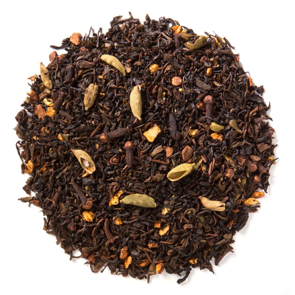 Davidson's Green Chai with Orange Peel cup steeping setup highlights vibrant color and citrus notes.