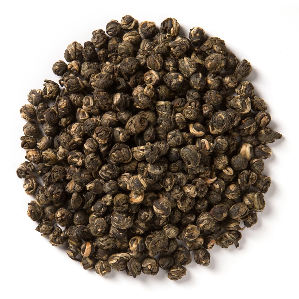 Davidson's Jasmine Pearls steeping in cup, revealing floral aroma and smooth flavor.