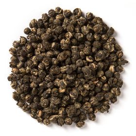 Davidson's Jasmine Pearls steeping in cup, revealing floral aroma and smooth flavor.