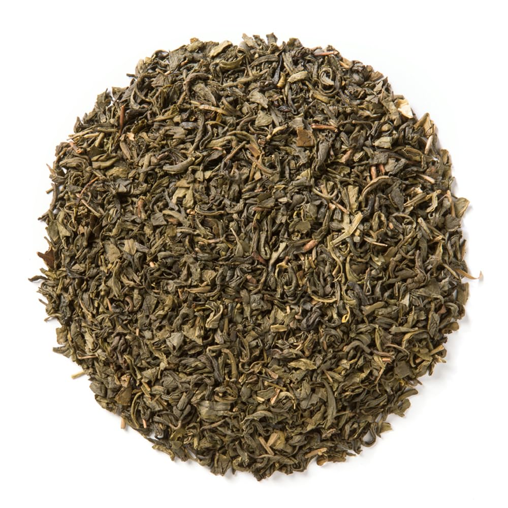 Mao Jian Jasmine leaves showing nut-like depth before infusion.