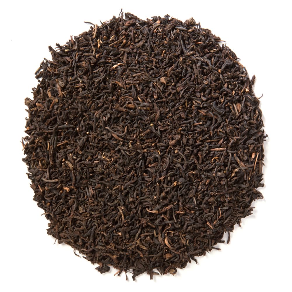Davidson's Organics decaf English Breakfast brew in cup, highlighting a rich, malty finish.