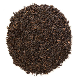 Davidson's Organics decaf English Breakfast brew in cup, highlighting a rich, malty finish.