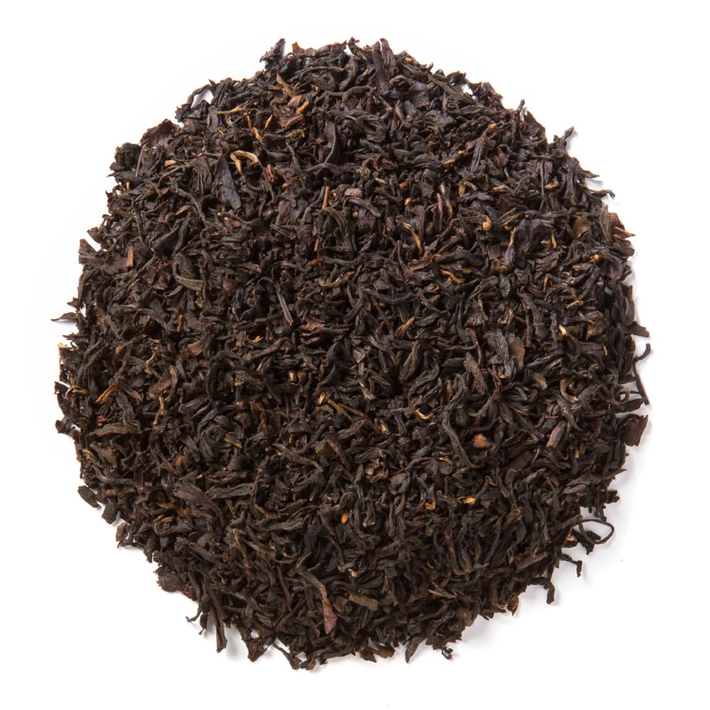 Dry leaves of Davidson's Organics Lapsang Souchong reveal smoky aroma and bold flavor potential