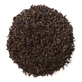 Dry leaves of Davidson's Organics Lapsang Souchong reveal smoky aroma and bold flavor potential