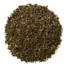 Davidson’s Organics tea leaf close-up showing non-GMO, pesticide-free leaves.