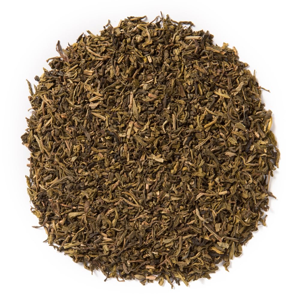 Pouring Davidson's Decaf Green Tea to steep, inviting aroma and flavor