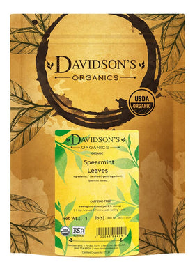 Davidson's Spearmint Leaves loose leaves closeup, vibrant greens for a refreshing infusion.